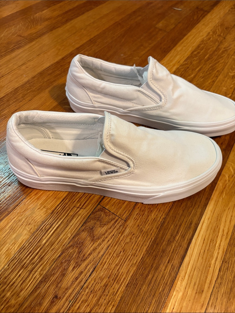 Vans White Canvas Slip-On Sneakers